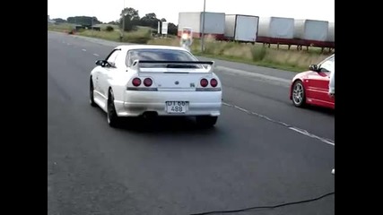 Nissan Skyline R33 Gtr vs. Mitsubishi Lancer