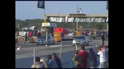 Mitsubishi Evo 8 vs. Audi S2 drag race