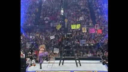 Edge Spears Matt Hardy on the Ladder