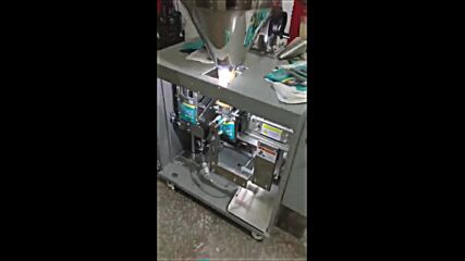 Автоматична дойпак пакетираща машина за прахообразни.