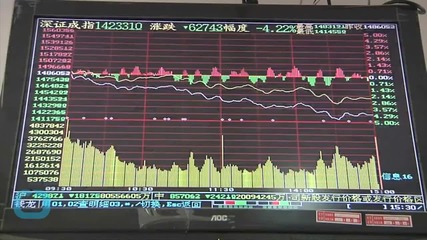 China Markets Slump Despite Central Bank Rate Cut