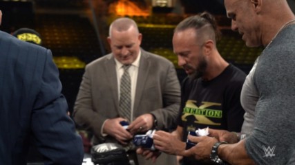 Triple H gives a special gift to his fellow DX members