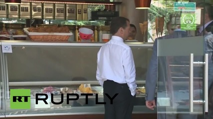 Russia: Medvedev fills his sweet tooth during confectionery store visitx