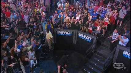 Aj Styles jumps on Tommy Dreamer off the wall