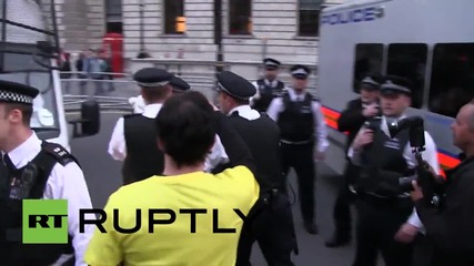 UK: As poll predicts tory win, protesters scrap with police outside parliament