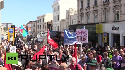 UK: Anti-austerity activists storm former Barclays Bank in Brighton rally