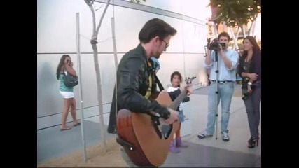Jackson Rathbone playing guitar in Eclipse tent city