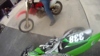 girl wheelies dirt bike