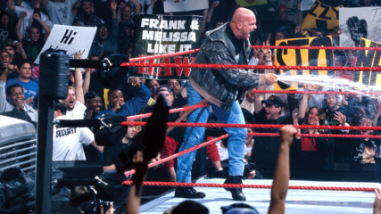 "Stone Cold" Steve Austin gives The Corporation a beer bath