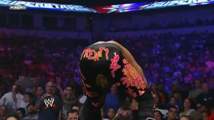 Diving Corkscrew Senton off the Barricade - Trent Barreta