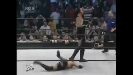 Undertaker chokeslams Gregory Helms