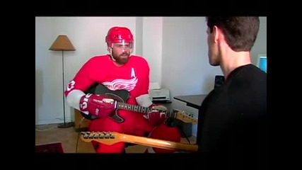 Henrik Zetterberg gets a guitar lesson 