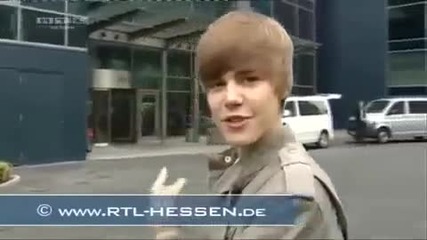 Justin Bieber running into a door.