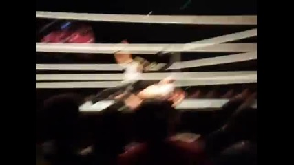 Dean Ambrose and Daniel Bryan duel with kendo sticks.
