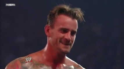 Madness Elbow Drop through the announcer table