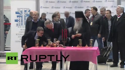 Russia: Holy Fire from Jerusalem lands in Moscow for Easter