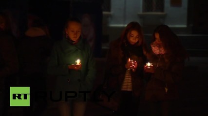 Russia: Mourners in Simferopol hold candle-lit tribute to flight 7K9268 victims