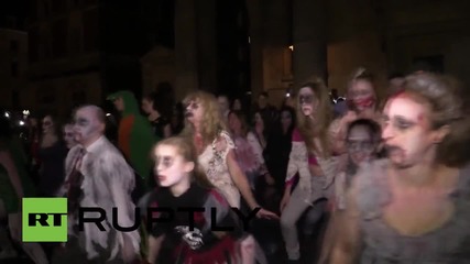 UK: THRILLER! All-dancing zombie flashmob spooks London spectators in mass MJ tribute