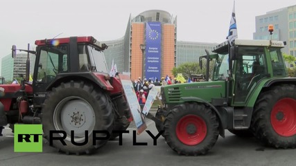 Belgium: Farmers start fires as they descend on EC HQ in Brussels