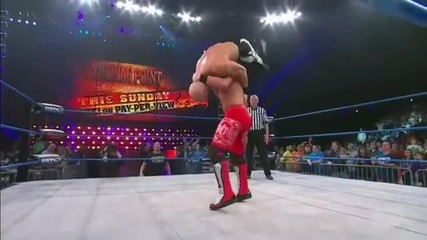 Fireman's Carry Backbreaker into Styles Clash
