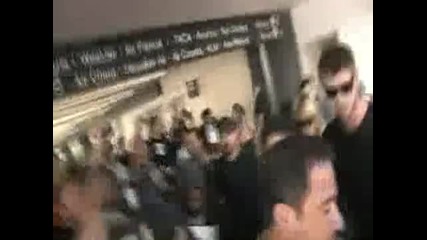 Miley Cyrus swarmed by paparazzi at Lax 