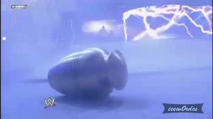 The Undertaker Хвърля светкавица пред Kane 