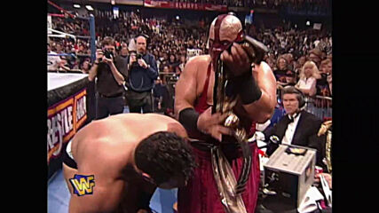 The Rock gets an assist from his dad Rocky Johnson in his WrestleMania debut: WrestleMania 13