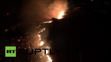 USA: Helicopters battle huge bush fire north of Los Angeles