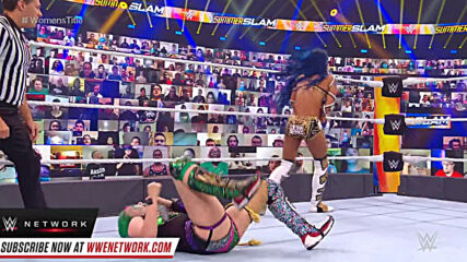 Sasha Banks powerbombs Asuka to the ringside floor: SummerSlam 2020 (WWE Network Exclusive)