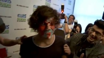 Harry Styles getting caked in the face