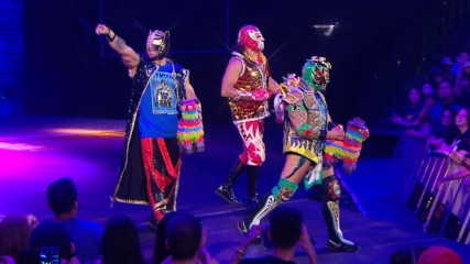 Lucha House Party celebrate during the commercial break: WWE.com Exclusive, July 1, 2019