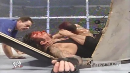 Batista Bomb On Undertaker Through Table Hd