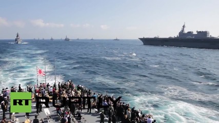 Japan: Prime Minister Abe presides over show of naval strength