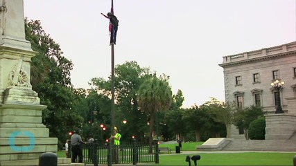 Woman Removes Confederate Flag in Front of SC Statehouse
