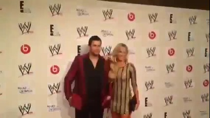 Fandango & Summer Rae pose for pictures on the red carpet at #stars4hope