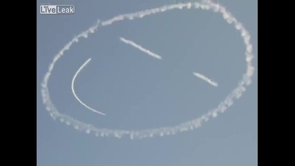Airplane making smiley face in the sky