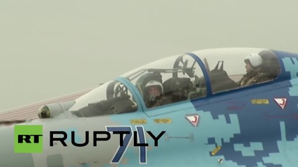 Ukraine: President Poroshenko flies aboard a SU-27 fighter jet