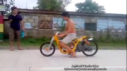 Shirtless drag racer with Awesome Skills and powerful Scoote
