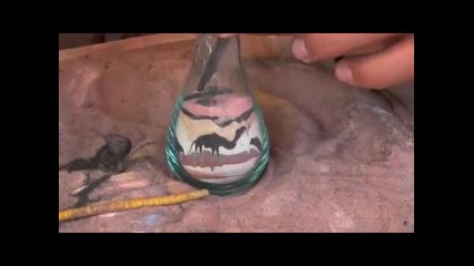 Прекрасно пясъчно изкуство в шише