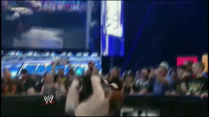 Mark Henry hits a World Strongest Slam on Sheamus into the Steel Steps