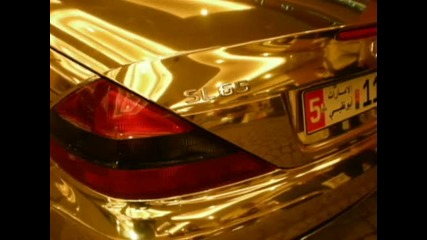 Two Golden Mercedes Amg Cars 
