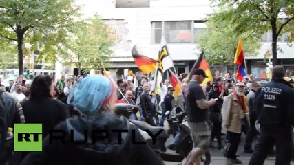 Germany: Pro and anti-BAERGIDA protesters face off on Unity Day