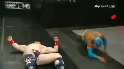 Sin Cara attacks Sheamus
