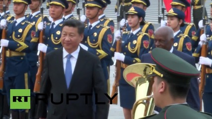 China: Xi Jinping welcomes Angolan President with military honours in Beijing