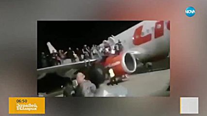 Паника и ранени след фалшива тревога за бомба в самолет (ВИДЕО)