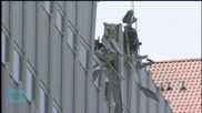 Material Being Lifted by Crane at NYC Building Falls