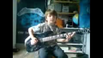 Eight year old plays metallica - one