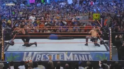 Edge Hits The Undertaker With The Camera 
