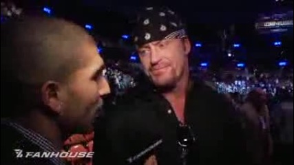 Undertaker Brock Lesnar exchange words following ufc 121 