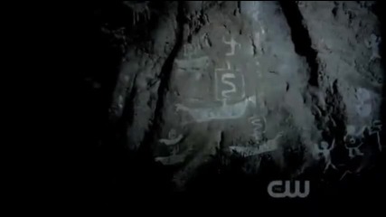 Damon gives Elena a fright while her and Alaric are walking through the cave tunnels